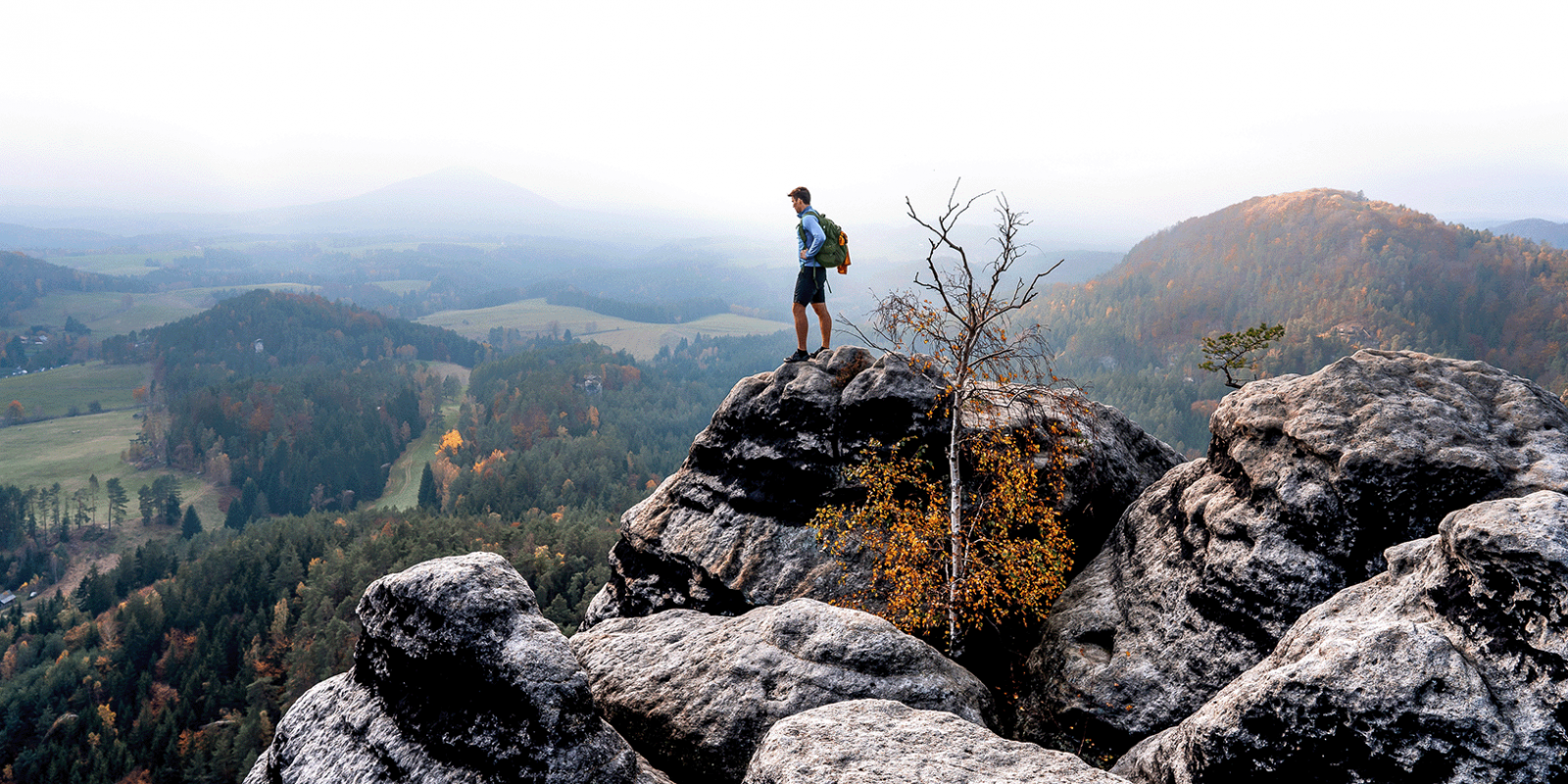 Man standing on a rocky mountain